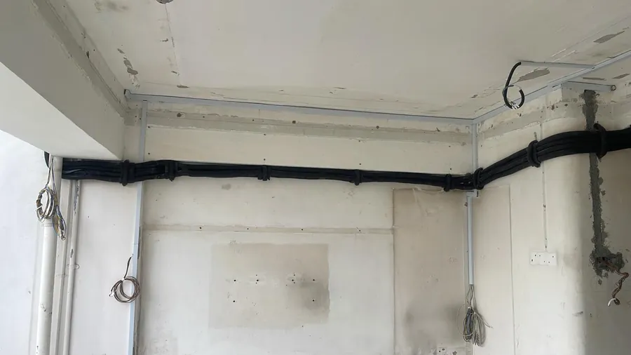 Neat copper piping and trunking from a Kim's Aircon installation